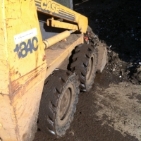 McLaren flat proof tire on Case 1840 skid steer loader